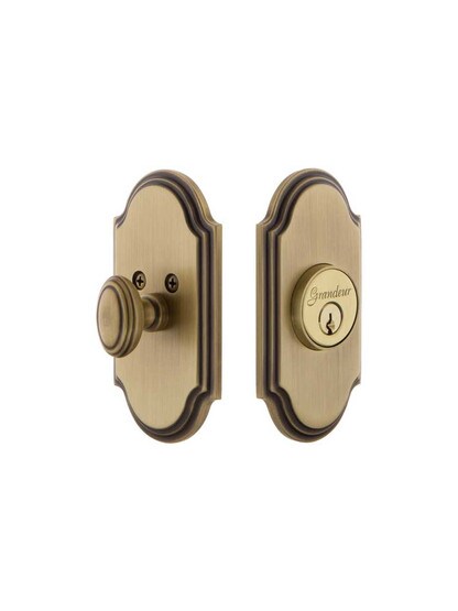 Grandeur Single-Cylinder Deadbolt with Arc Plates Keyed Alike in Antique Brass.